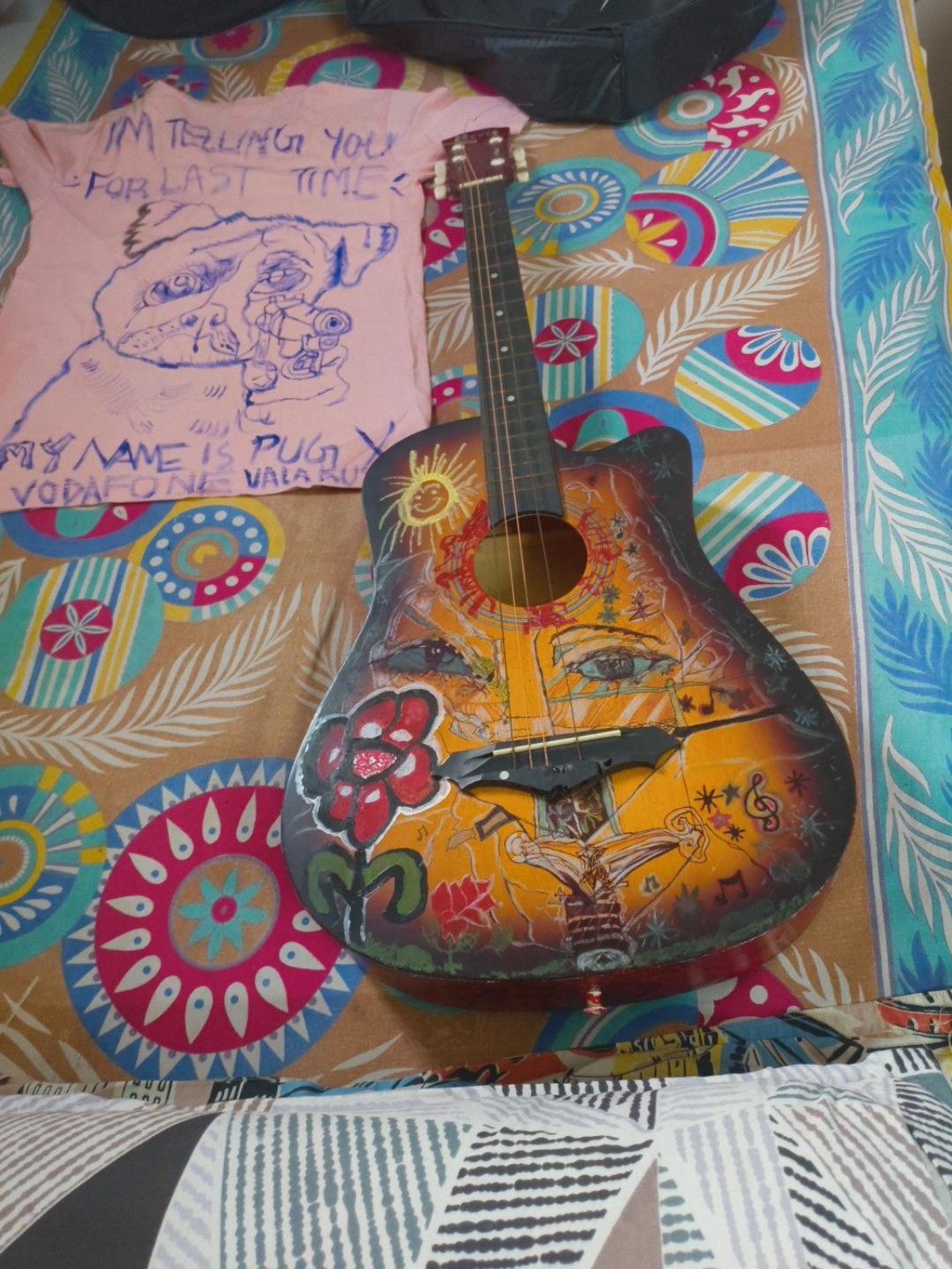 The Cosmic Canvas orange illustrated guitar artwork